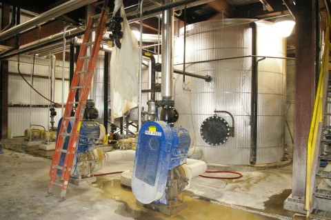 Foreground – Filter Feed Tank and Pumps with Sweet Water and 1st Filtrate Behind